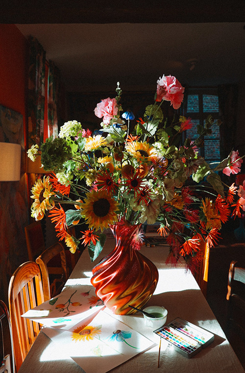 Flower bouquet in purple vase