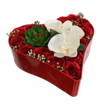 ROSE ORCHID ARR IN PLASTIC HEART 29X27X13CM RED